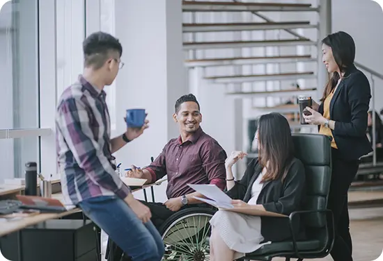 Team of colleagues in the office talking
